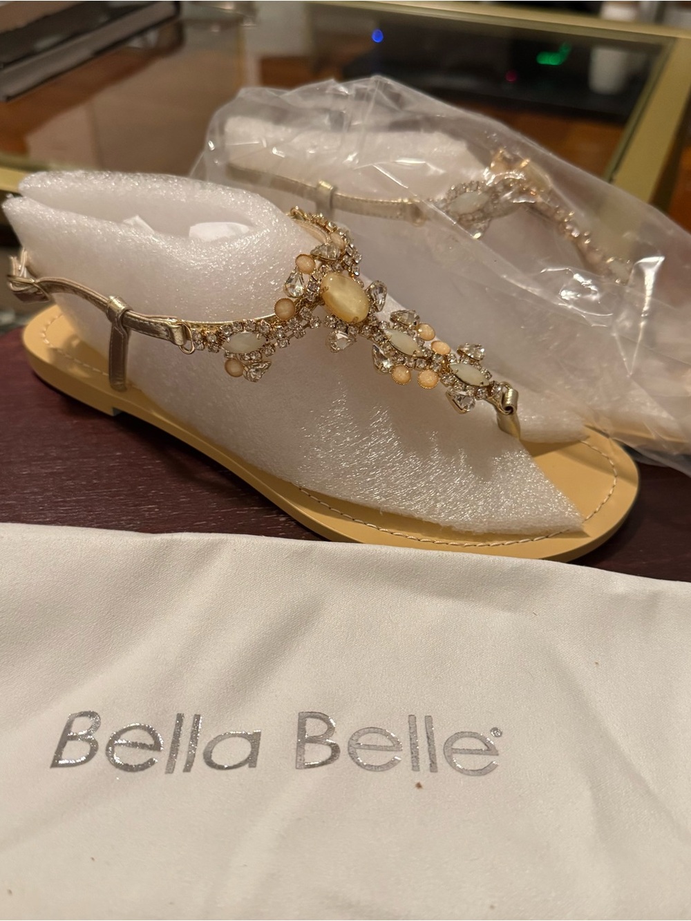Bella Belle Gold Jeweled T-Strap Sandals with Cream Accents